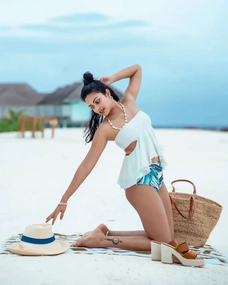 Amala Paul Sizzling Photoshoot in White Outfit