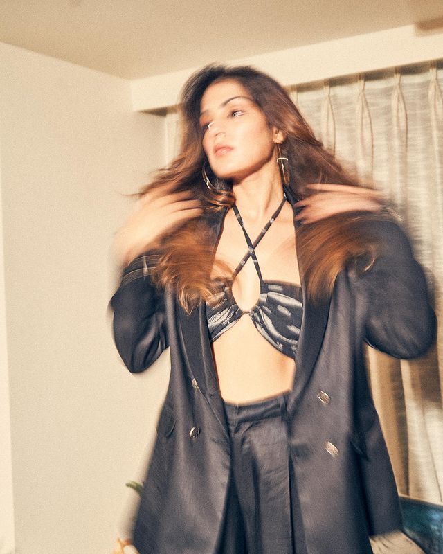 Rhea Chakraborty Looks all Classy, Chic and Bossy in this Black Pants Suit!