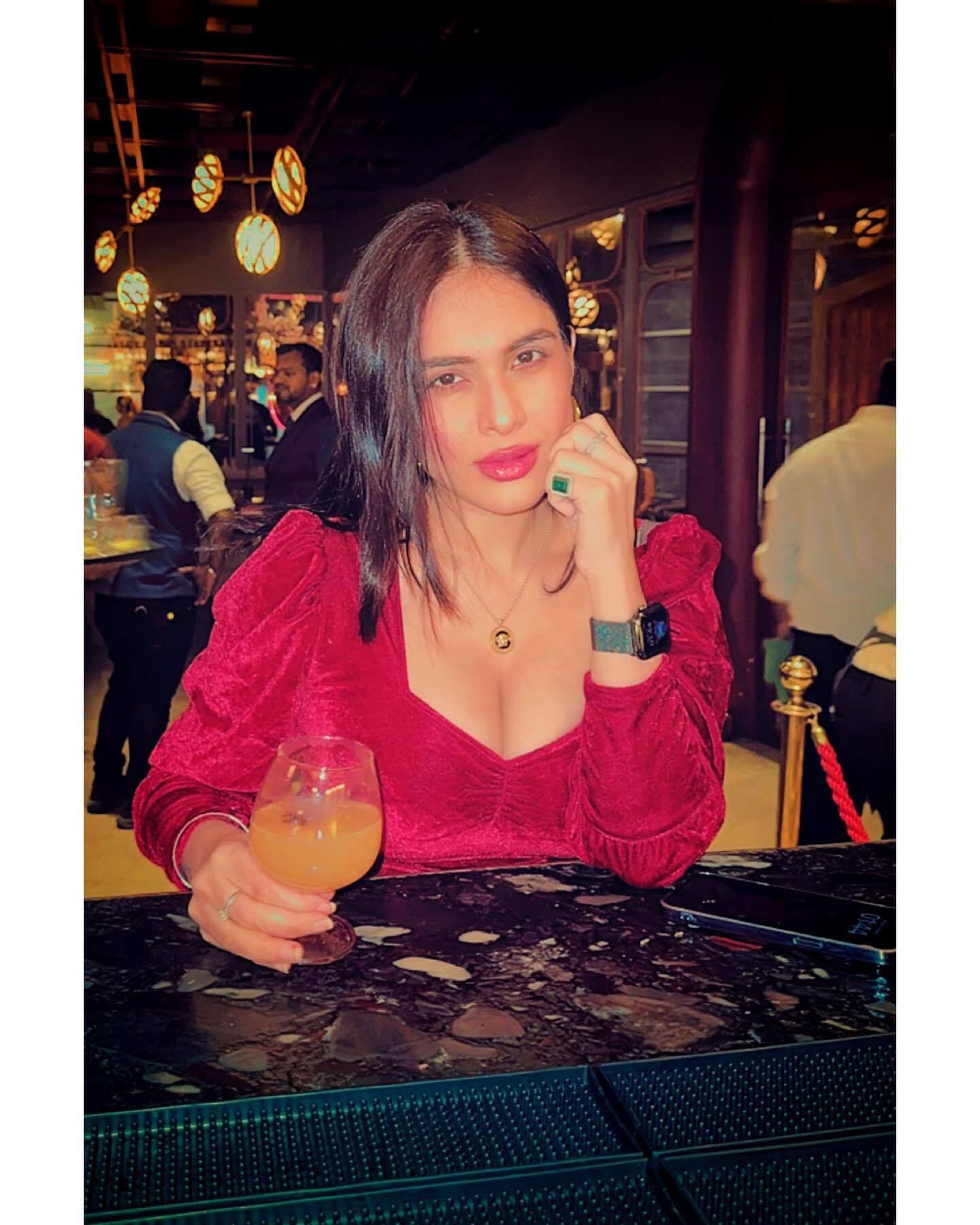 neha malik looks soo hot in red velvet one piece dress Filmibeat Hindi