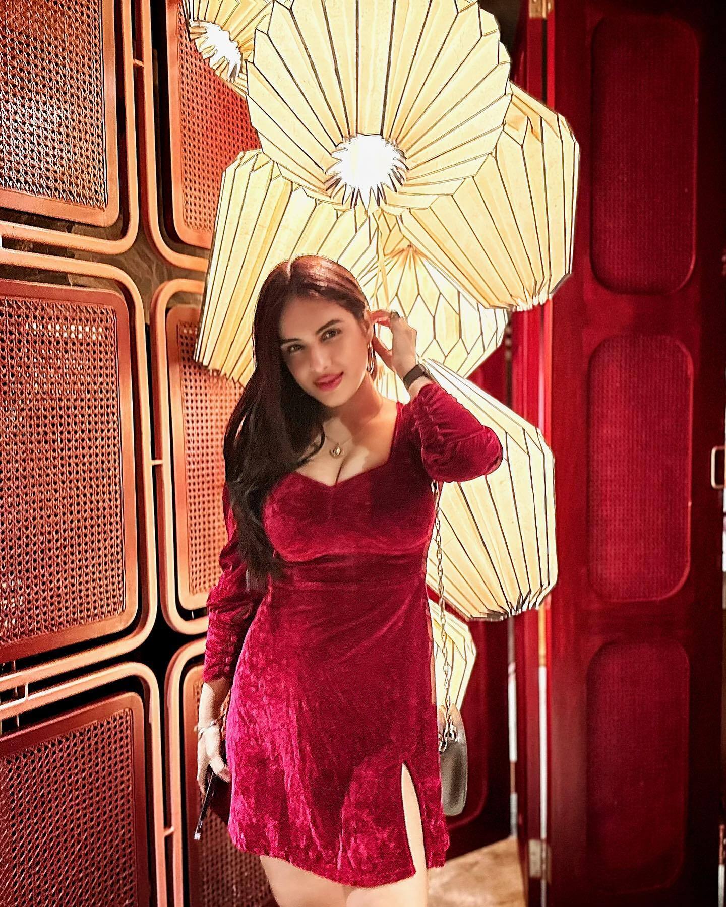 neha malik looks soo hot in red velvet one piece dress Filmibeat Hindi