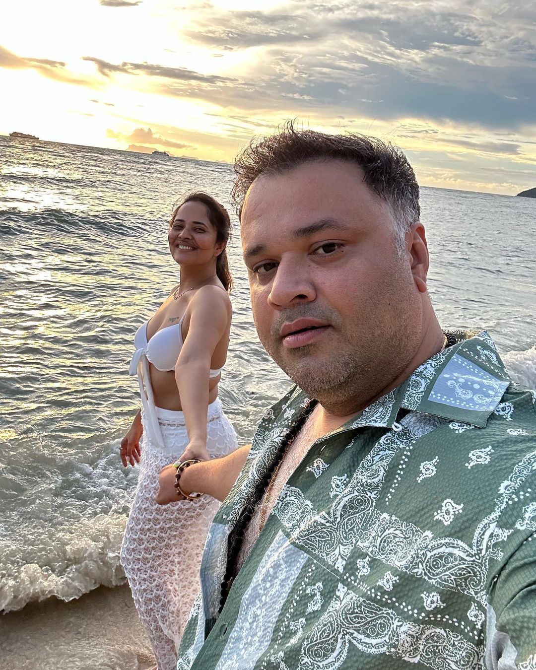 Anasuya Bharadwaj liplocks husband Sushank in Thailand as they celebrate their 13th wedding Anniversary, pictures go viral