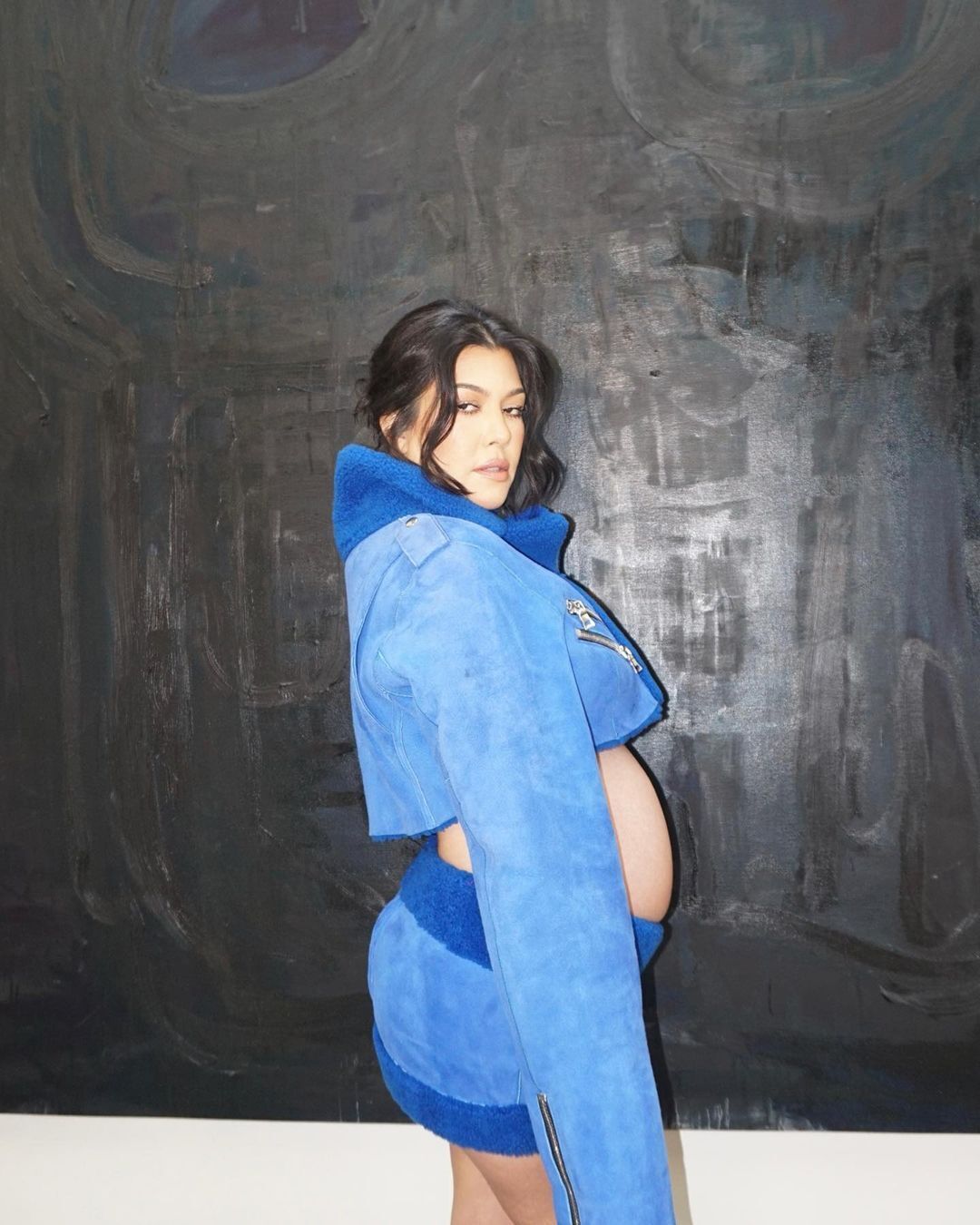 Kourtney Kardashian Stuns in Eye-Catching Neon Blue Maternity Attire