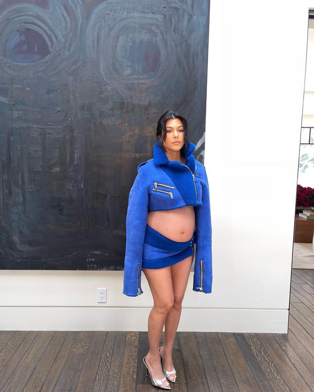 Kourtney Kardashian Stuns in Eye-Catching Neon Blue Maternity Attire