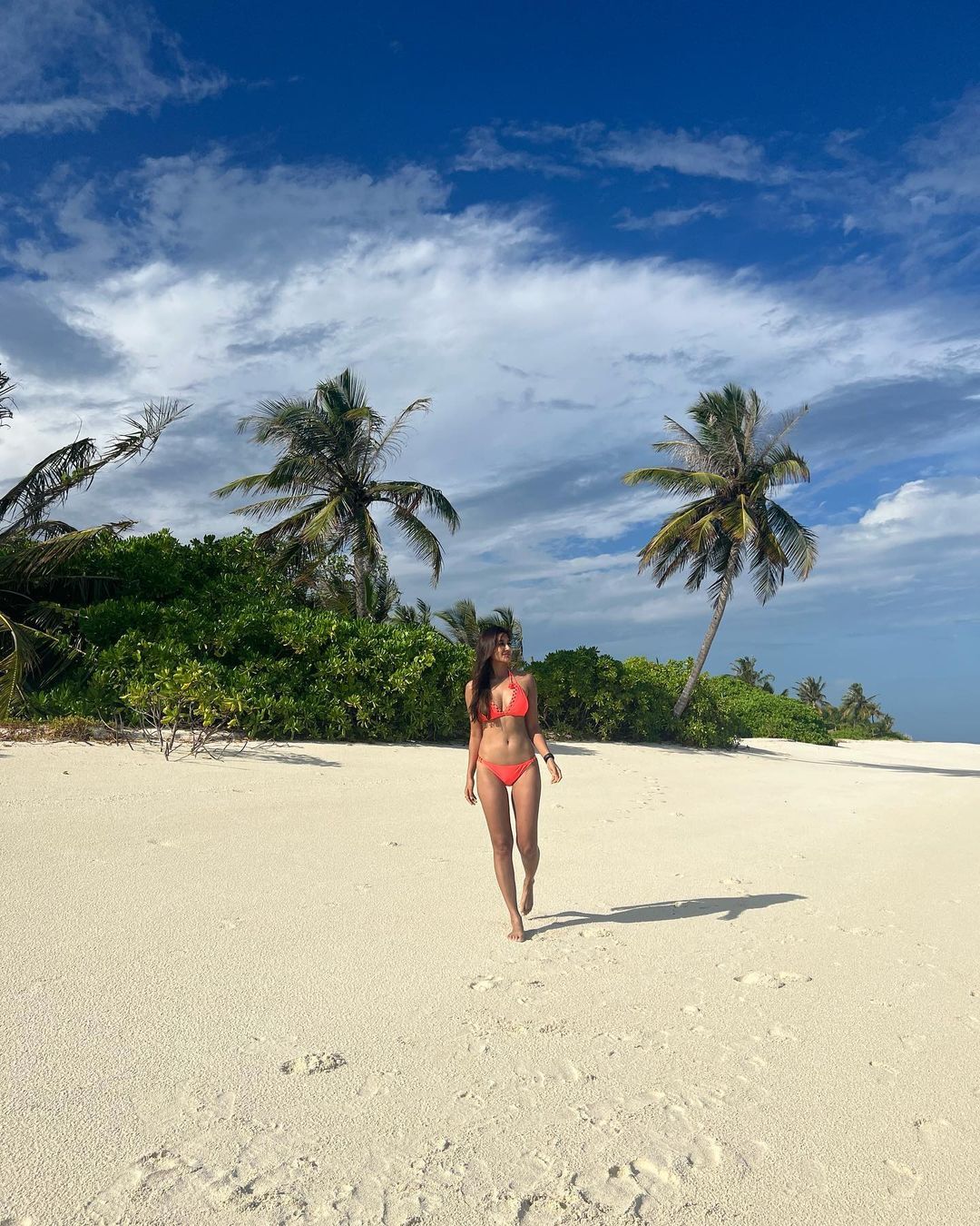 Nikita Dutta's Stunning Orange Bikini Photos Break the Internet