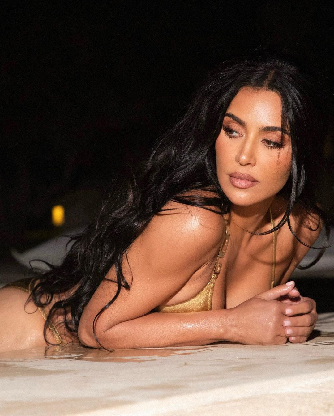 Kim Kardashian's Golden Bikini Photoshoot Sets the Internet Ablaze