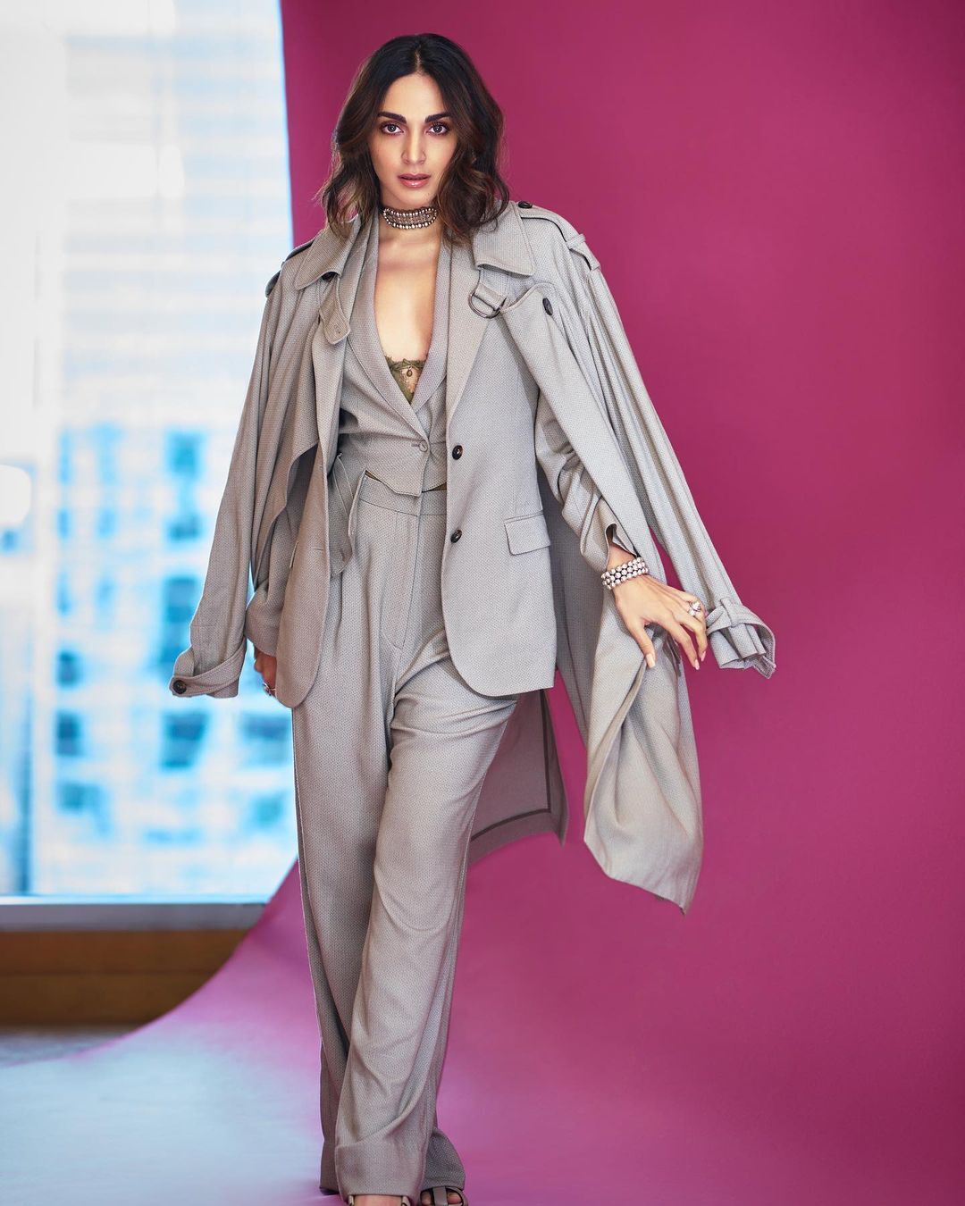 Kiara Advani nails the power look in a grey pantsuit, radiating boss babe energy.