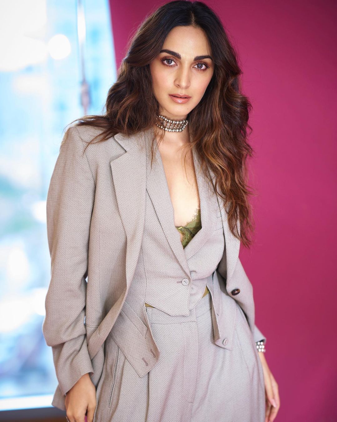 Kiara Advani stuns in a tailored grey pantsuit, embodying the essence of a boss babe
