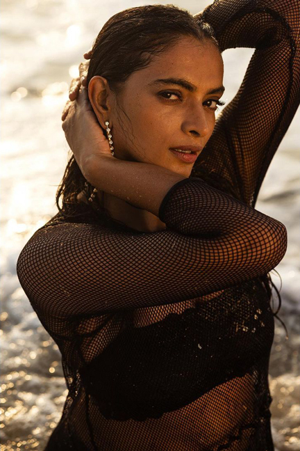 Amalda Liz exudes glamour in a captivating photoshoot, appearing stunning as she embraces a wet look