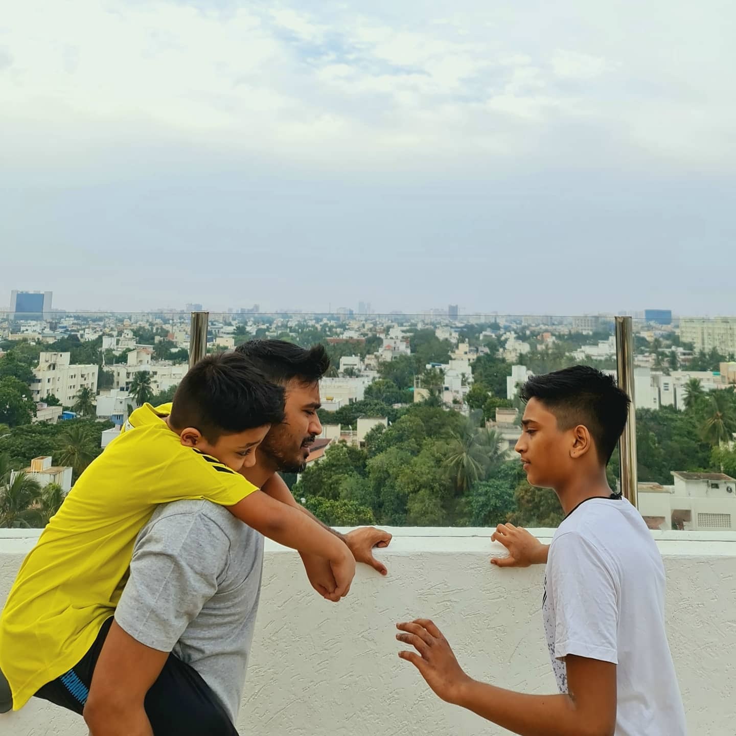 Dhanush captures a delightful candid moment with his sons, Yatra and Lingaa, radiating warmth and af