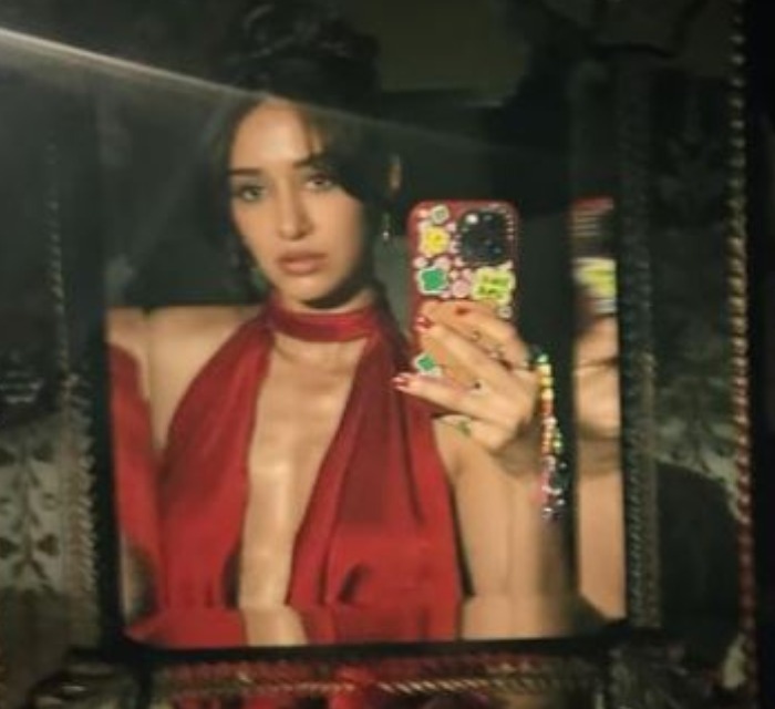 Gorgeous disha patani rocks in red deep neck backless gown