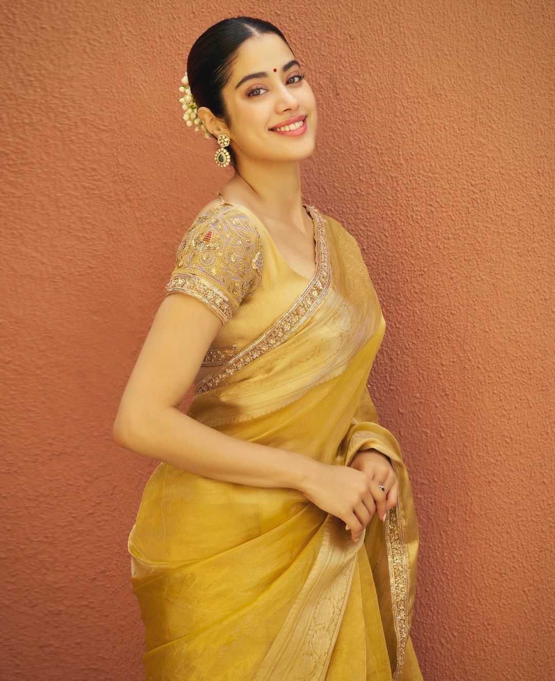 Janhvi Kapoor in a traditional yellow saree