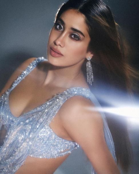 Janhvi Kapoor steals the spotlight in a shimmery ice blue saree, leaving a trail of enchantment