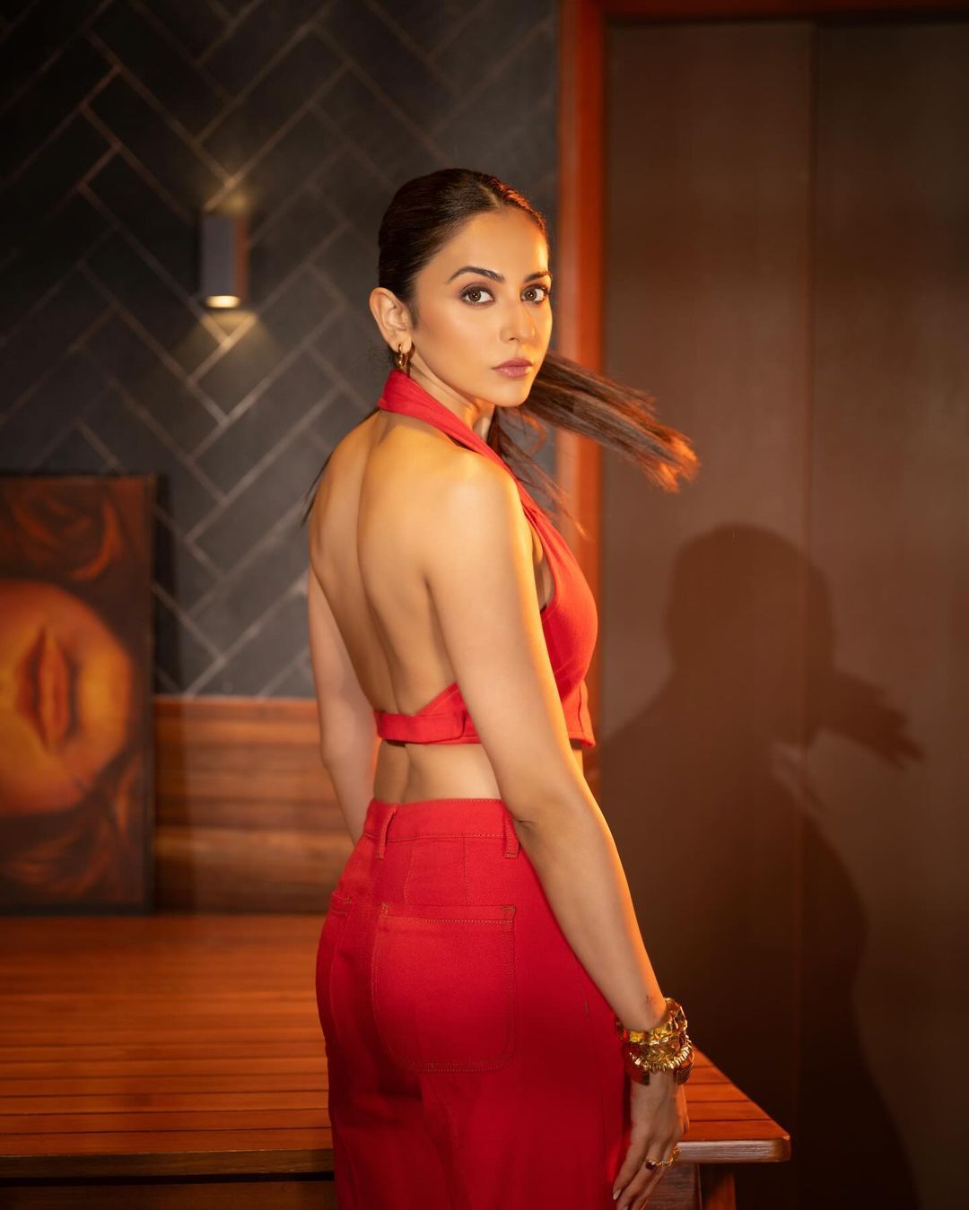 Rakul Preet Singh has posted a series of photos looking fiery red hot dress