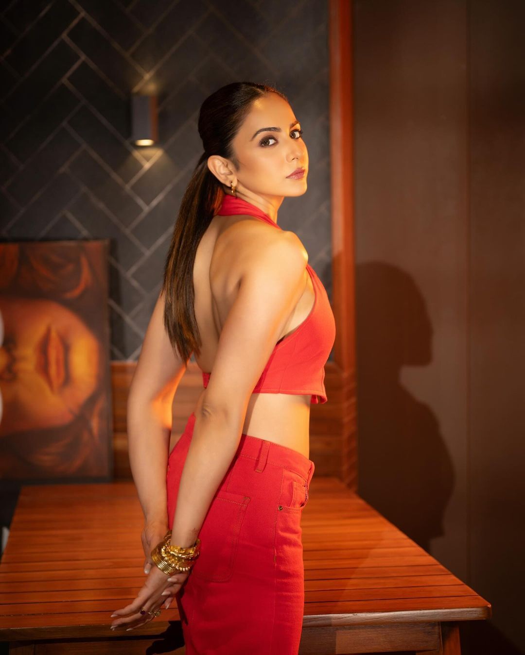 Rakul Preet Singh has posted a series of photos looking fiery red hot dress