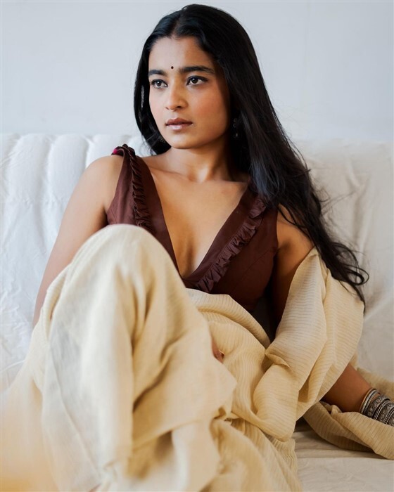 Chaithra Achar looks stunning and gorgeous in saree and deep neck blouse