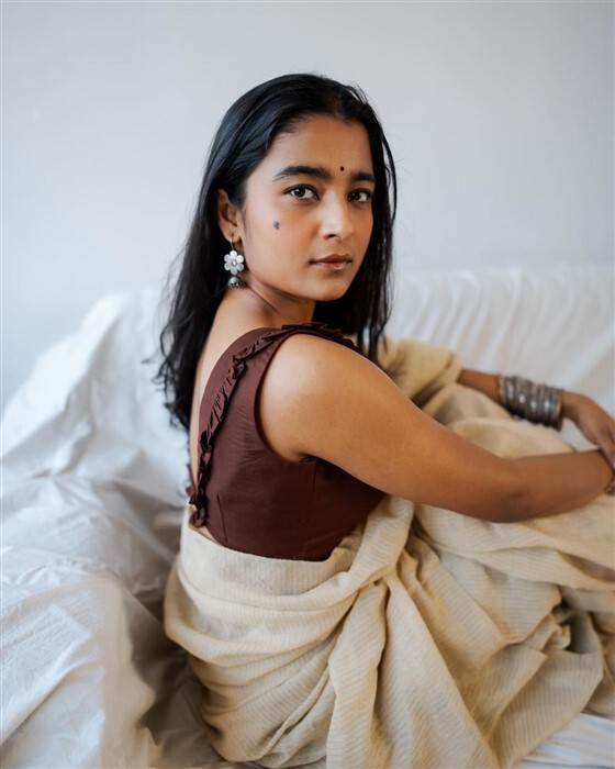 Chaithra Achar looks stunning and gorgeous in saree and deep neck blouse