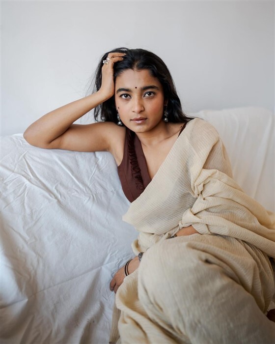 Chaithra Achar looks stunning and gorgeous in saree and deep neck blouse