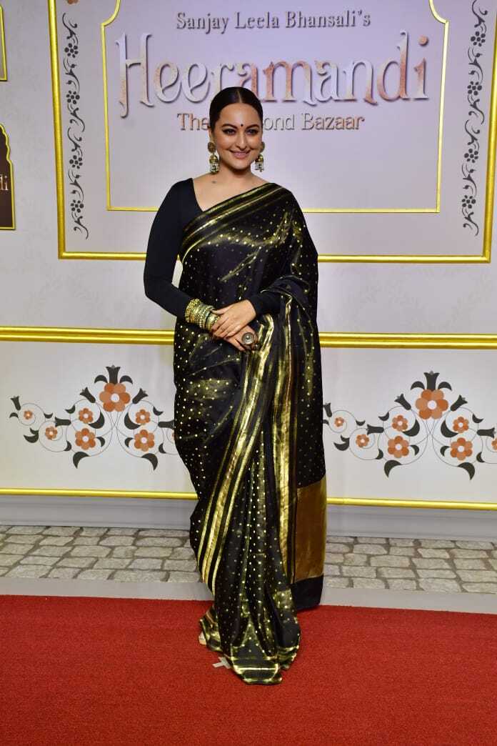 Sonakshi Sinha dazzles in an all black and golden saree