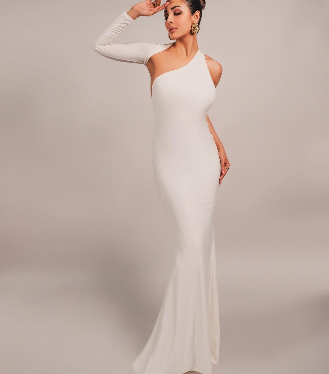 Malaika Arora Stuns in a Fitted White Gown