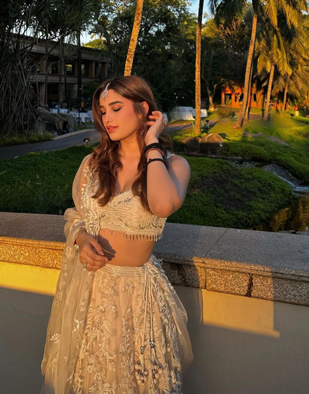 Rasha stuns in a gorgeous white lehenga.