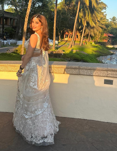 Rasha shines in a stunning white lehenga ensemble