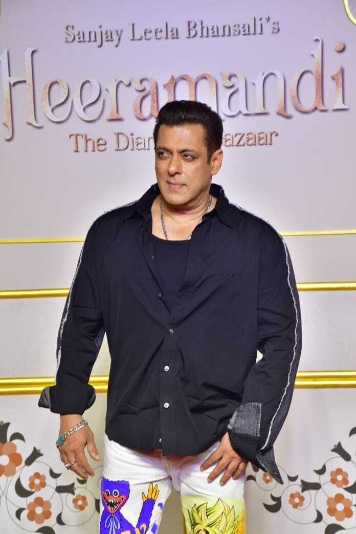 Salman Khan Sports Japanese Manga Characters on White Pants