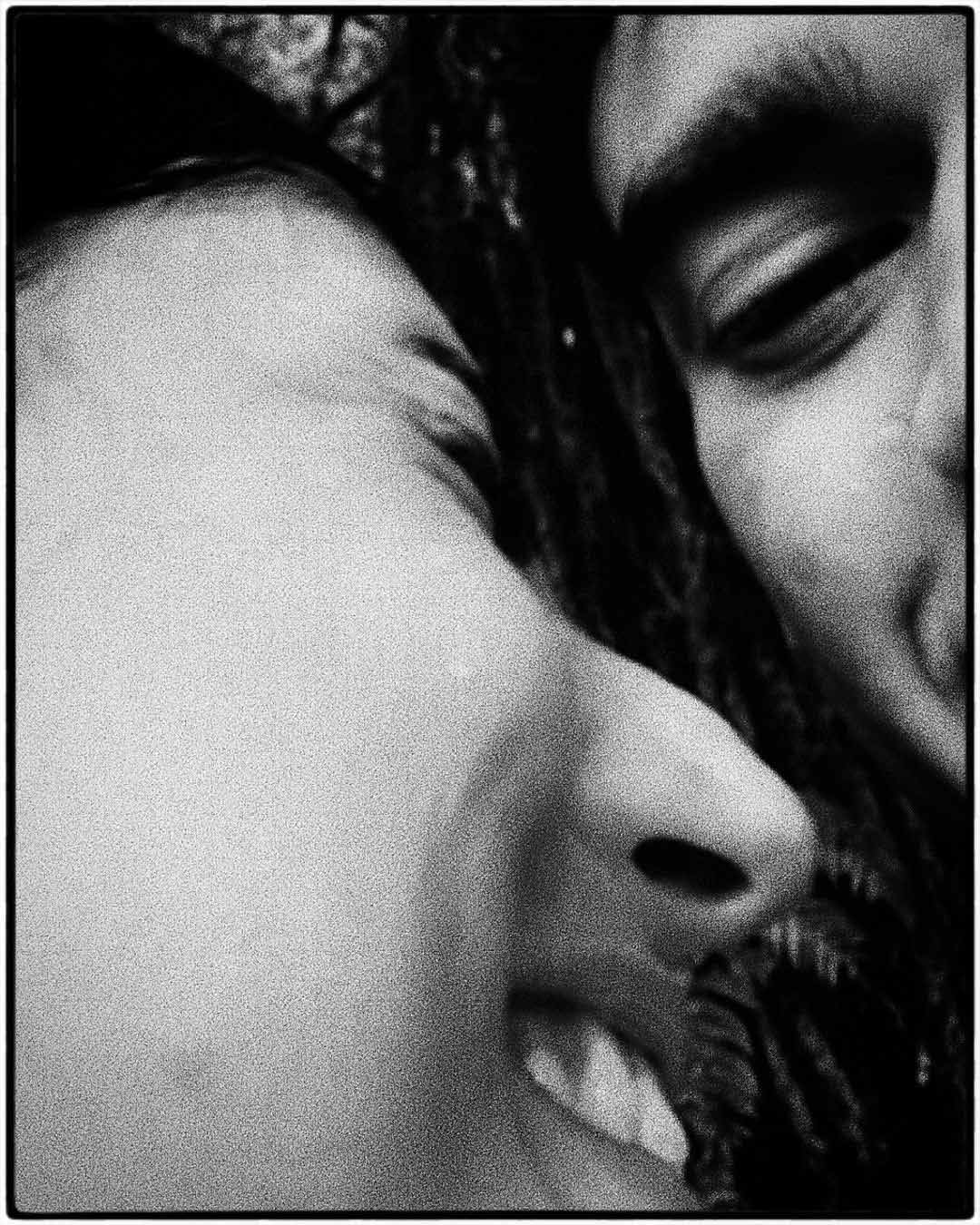 Babil and the girl share smiles, hinting at a connection.