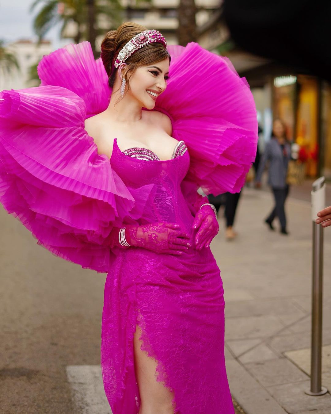 Urvashi Dazzles in Bright Pink Gown and Tulle Shrug