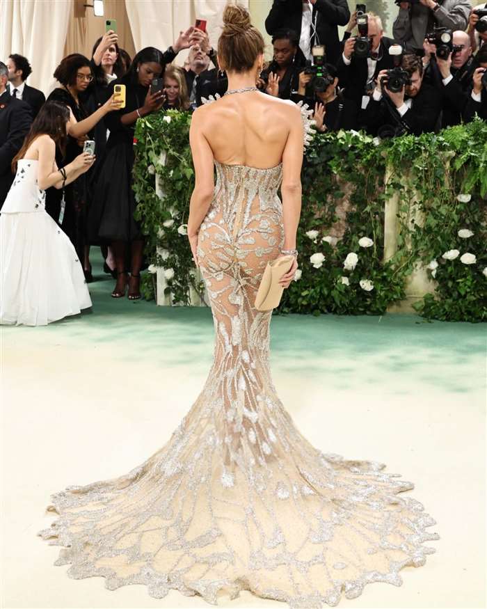 sachin and babi light blue dress Jennifer Lopez in a Plunging Black Backless Dress