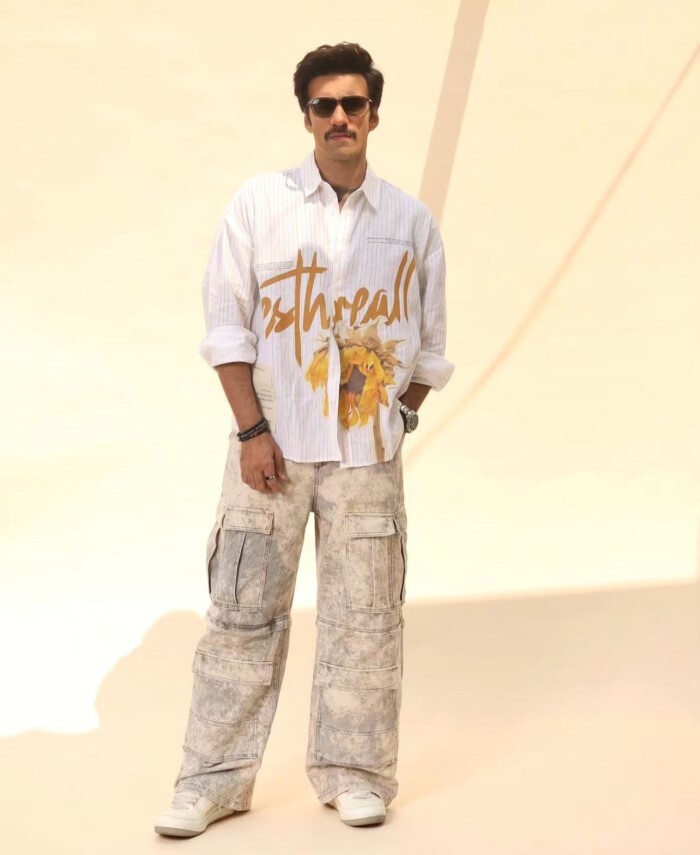Avinash Tiwary: Opting for a playful twist, Avinash rocks a graphic shirt paired with cargo pants