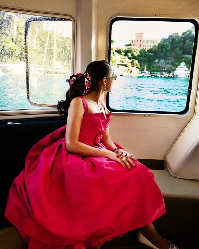 For the grand gala in Portofino, she opted for a raspberry pink cocktail dress from Christian Dior's Autumn Winter 1959 collection