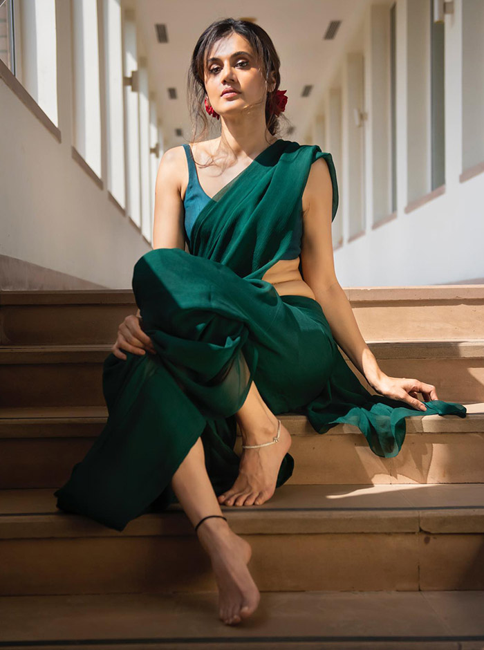 Once again, Taapsee left the internet stunned as she shared a snap of herself decked up in a dark green saree from her collection of drapes