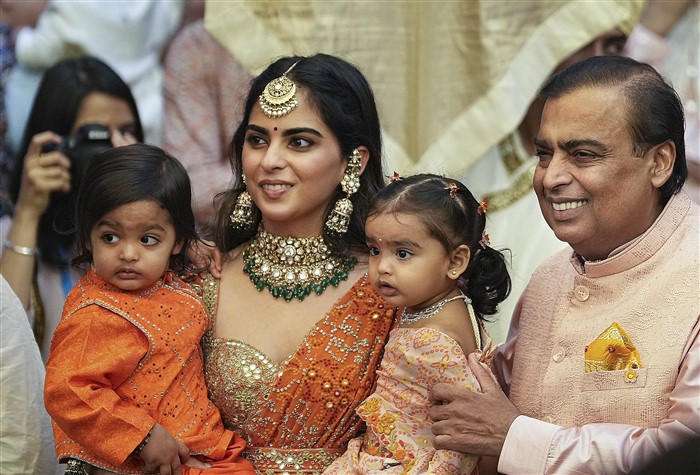 Reliance Industries Chairman Mukesh Ambani with daughter Isha Ambani and grandchildren during a pre-wedding ceremony