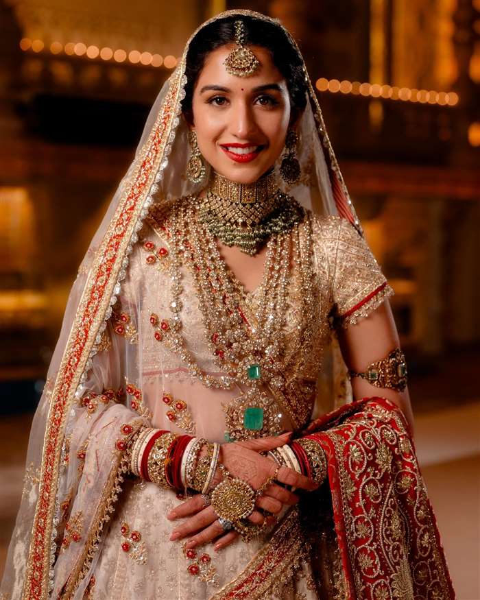 Anant Ambani Radhika Merchant Wedding Bridal Look Wears Traditional Red White Lehenga