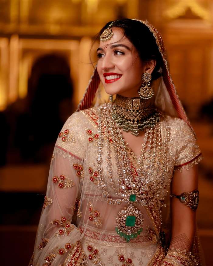 Anant Ambani Radhika Merchant Wedding Bridal Look Wears Traditional Red White Lehenga