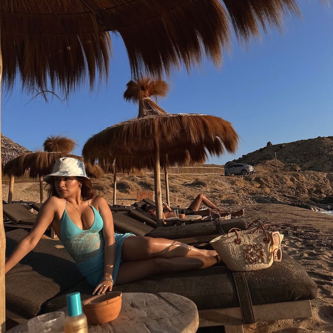 Avneet Kaur dazzles in her striking blue net dress with a plunging neckline.