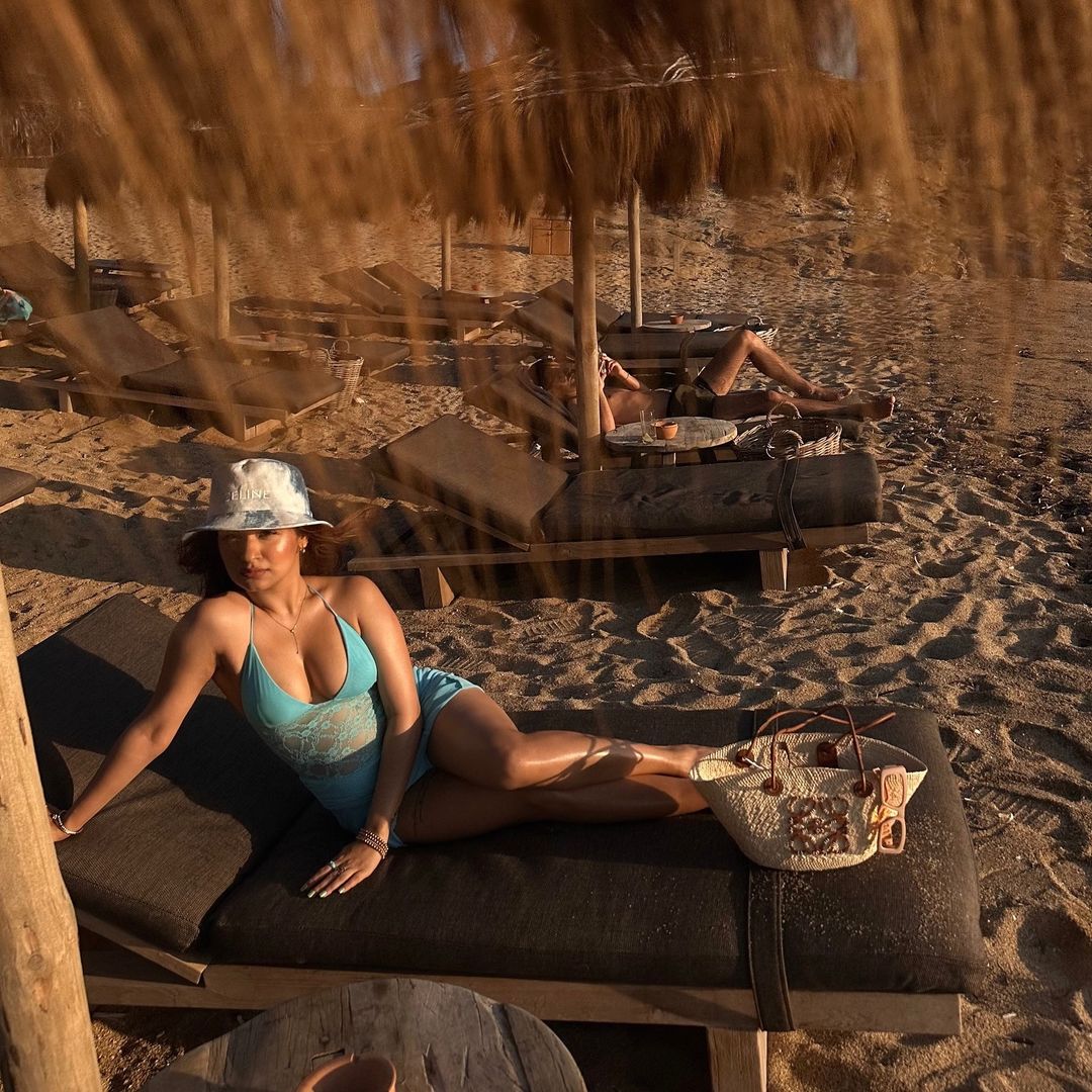 Sizzling in blue: Avneet Kaur wows in a net dress with a plunging neckline.