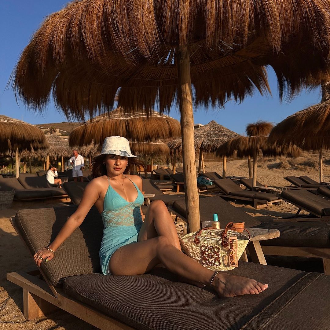 Avneet Kaur raises the style bar with her stunning blue net dress and daring neckline.