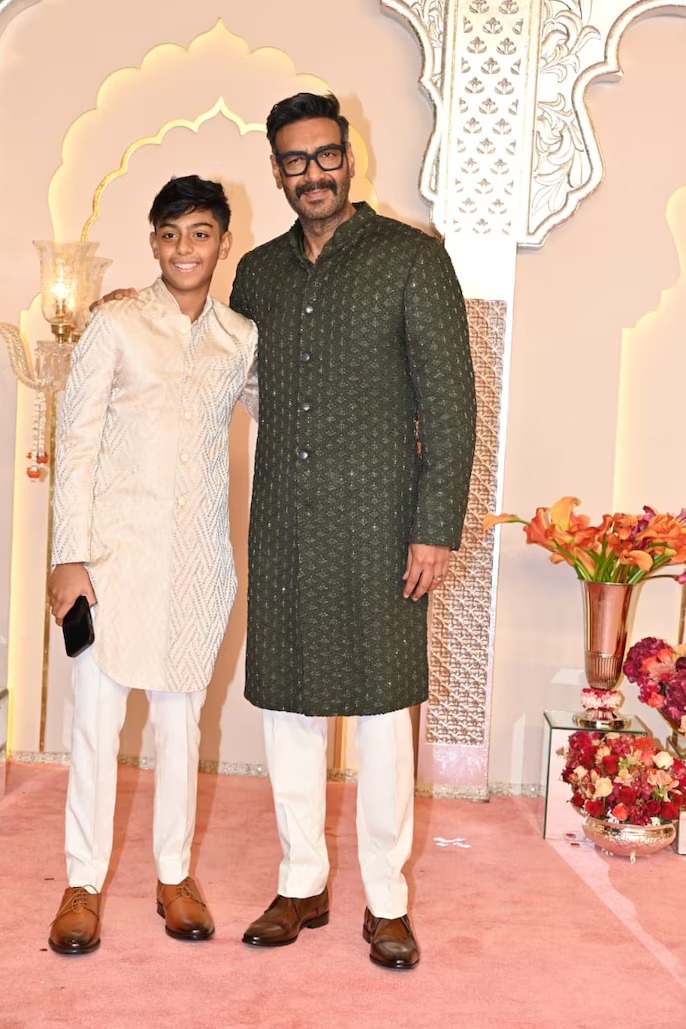 Ajay Devgn with his son Yug at Anant Ambani And Radhika Merchant Wedding Celebration.