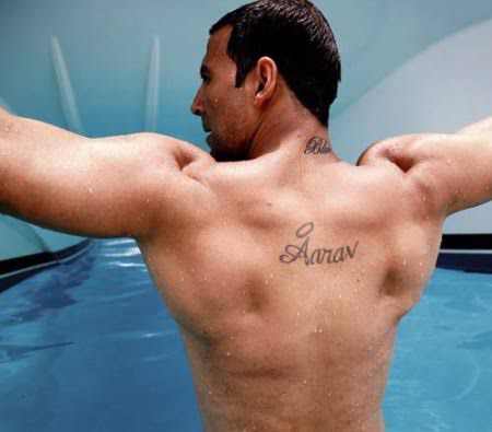 Akshay Kumar, the ‘Khiladi’ of Bollywood, has tattoos that reflect his profound love for his family. One notable tattoo is on his upper back, where he inked his son Aarav's name in 2007.