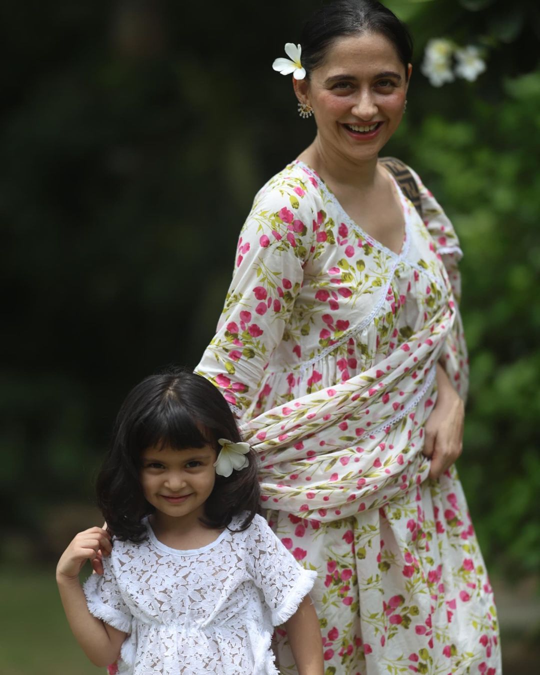 Sanjeeda donned a white and pink floral printed cotton salwar kameez with a matching dupatta.  Sanjeeda donned a white and pink floral printed cotton salwar kameez with a matching dupatta.