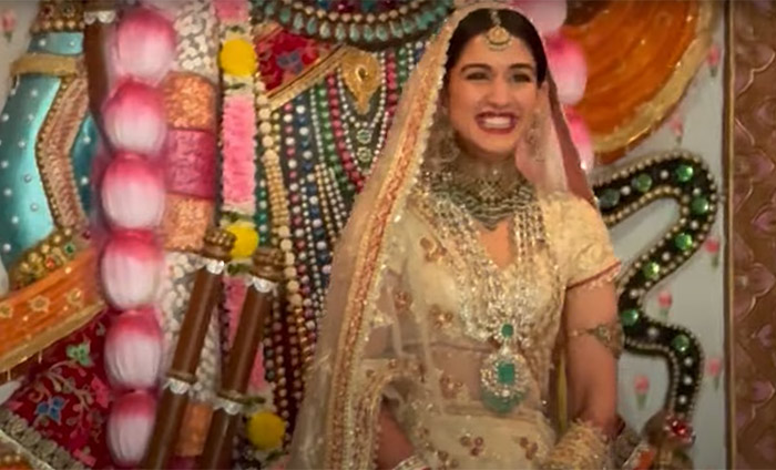The beautiful bride Radhika Merchant is all smiles as she makes her bridal entry.