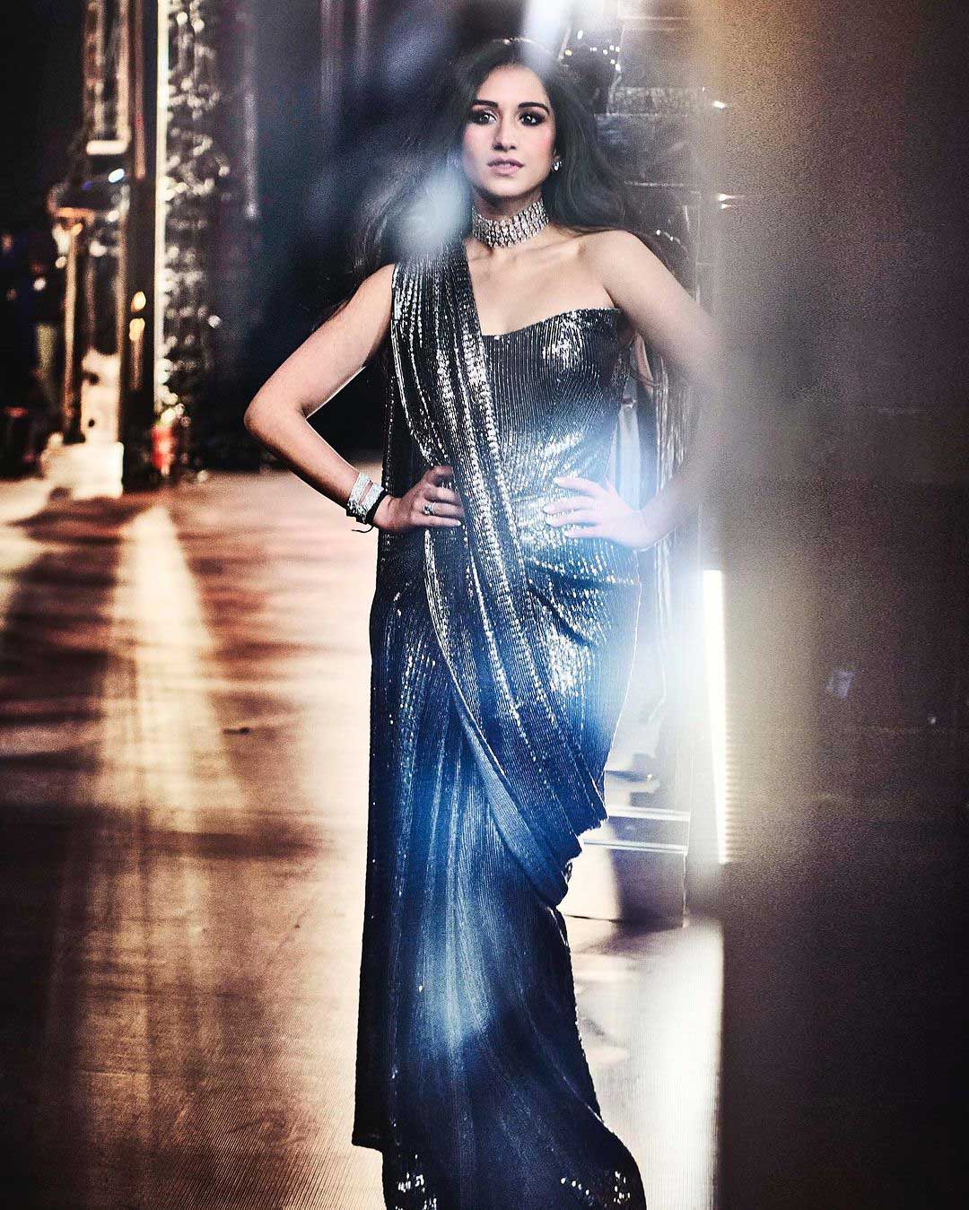 Radhika Merchant stuns at her sangeet celebrations in a dazzling chainmail saree, showcasing impeccable fashion sense