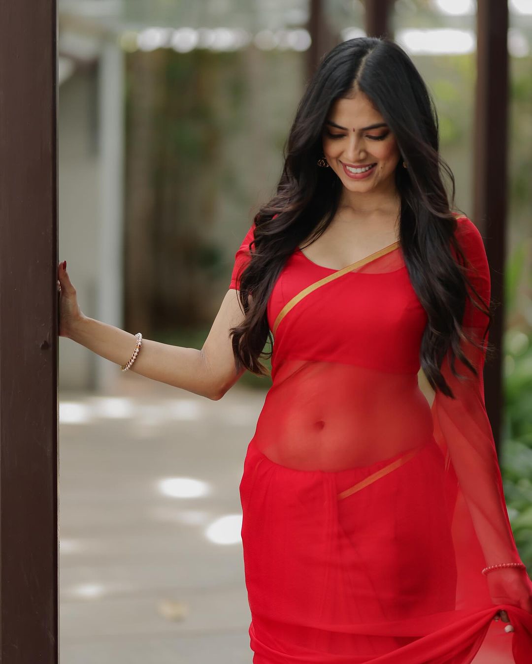 In a striking red saree, Malavika Mohanan exudes sophistication and style