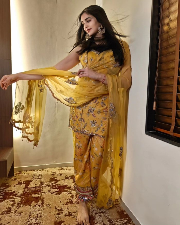 In one post, she is seen wearing an elegant yellow traditional dress designed by Label Priyanka Singh, featuring intricate embroidery.