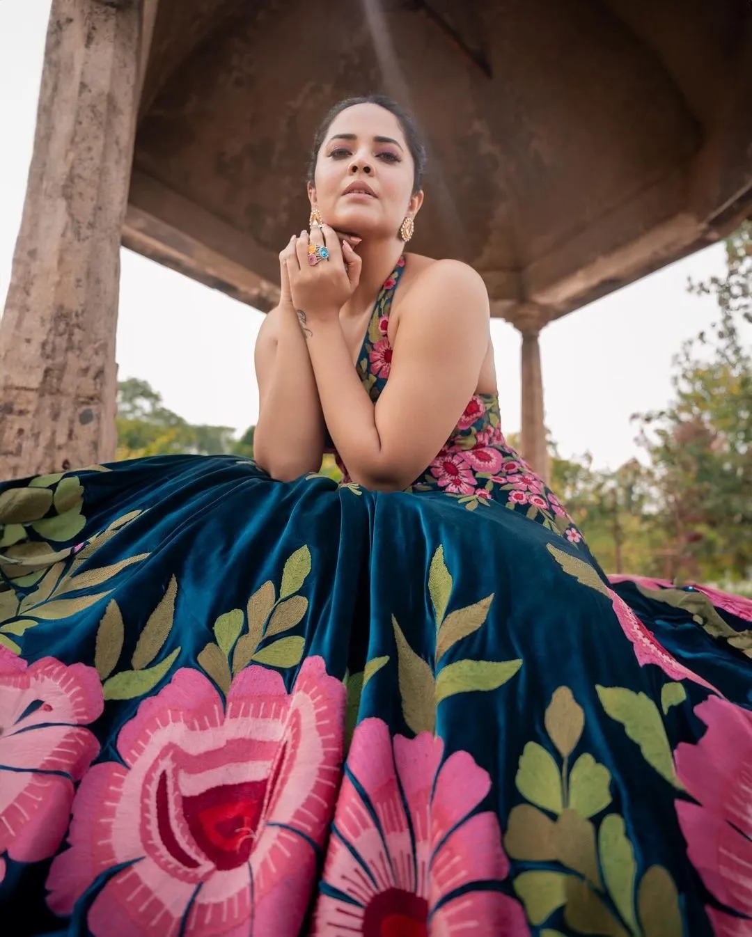 Anasuya Bharadwaj’s latest photoshoot feature her in a beautiful floral design gown