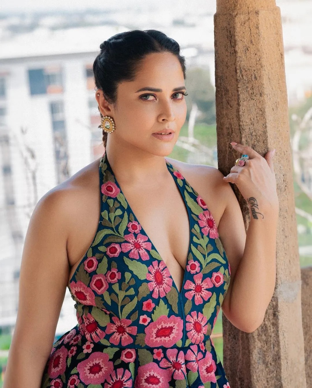 Anasuya Bharadwaj’s latest photoshoot feature her in a beautiful floral design gown