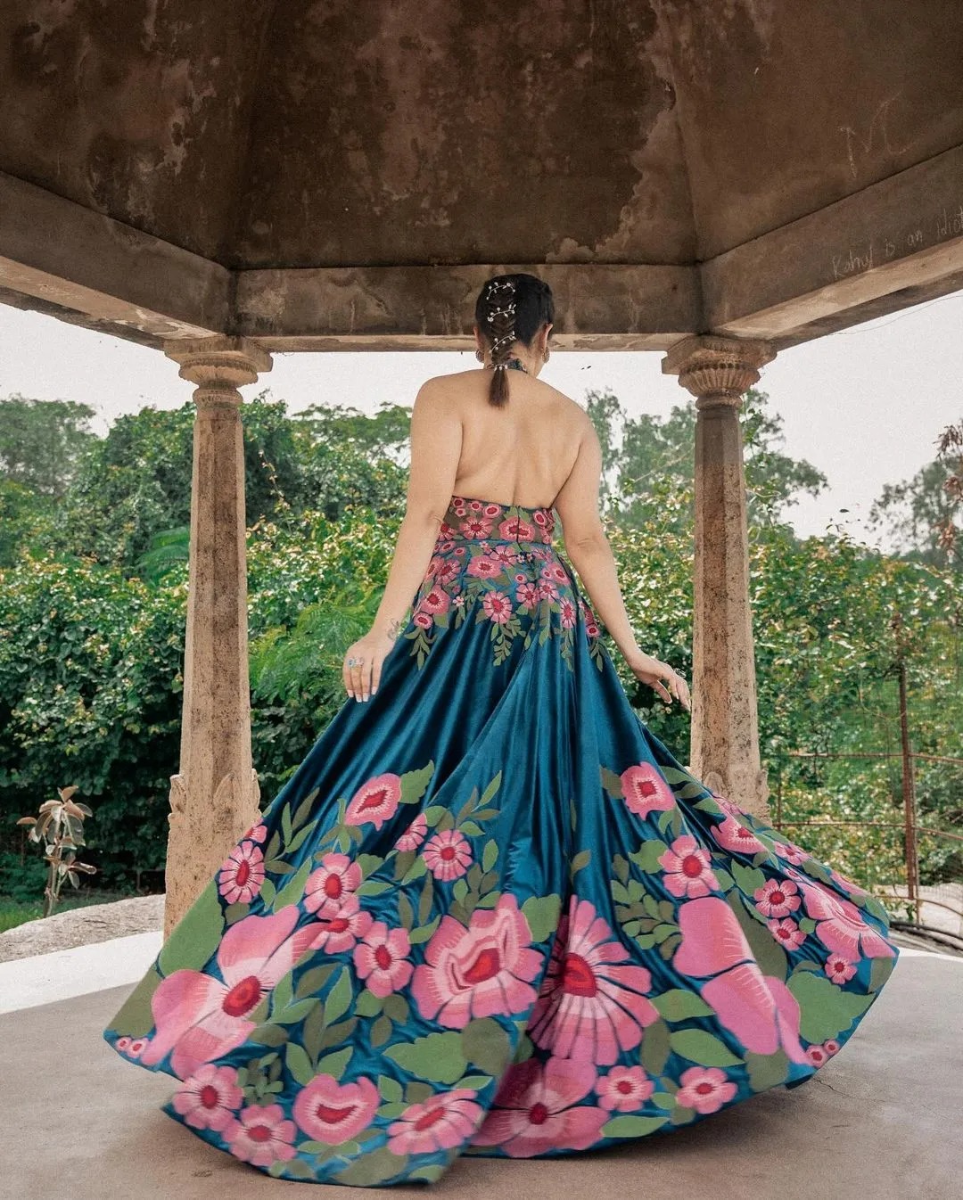 Anasuya Bharadwaj’s latest photoshoot feature her in a beautiful floral design gown