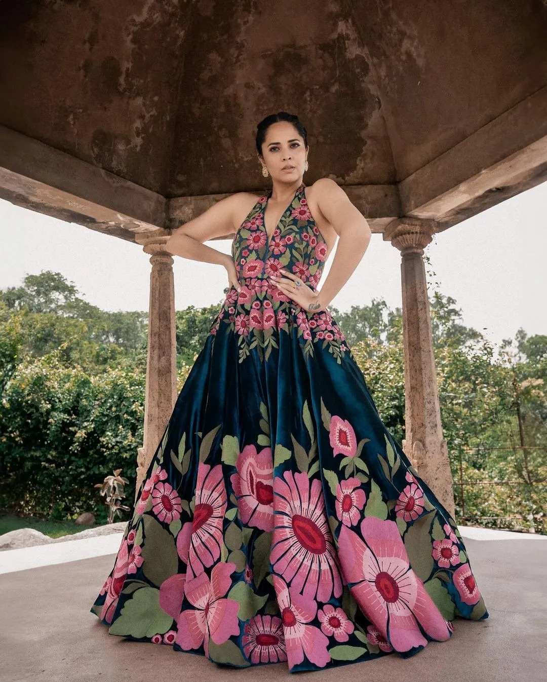 Anasuya Bharadwaj’s latest photoshoot feature her in a beautiful floral design gown