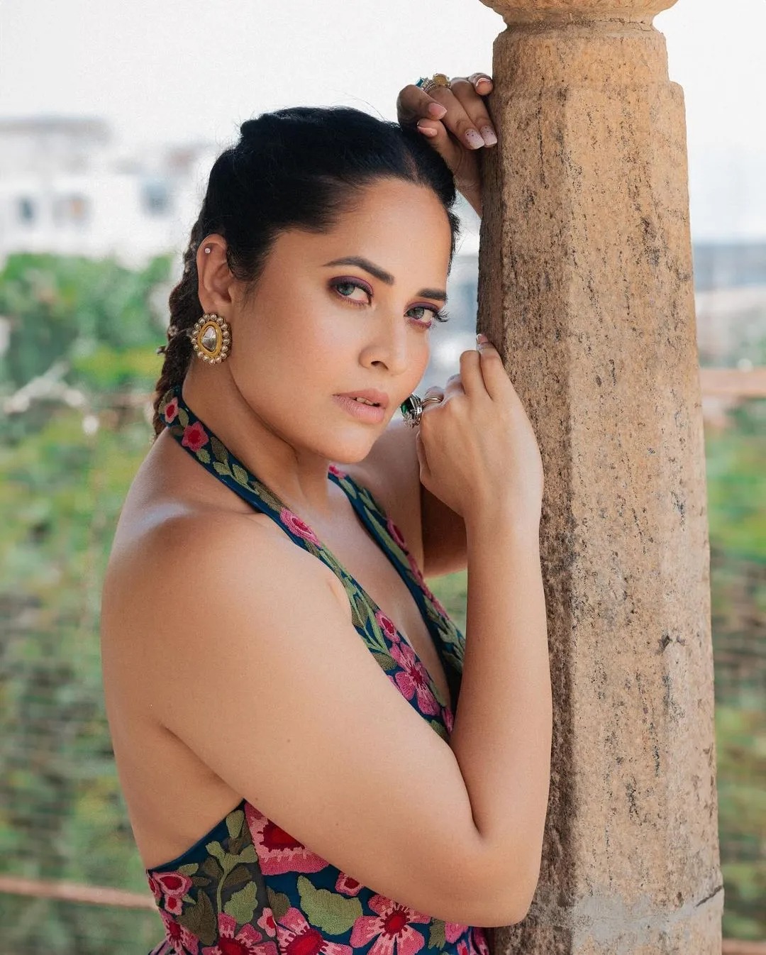 Anasuya Bharadwaj’s latest photoshoot feature her in a beautiful floral design gown